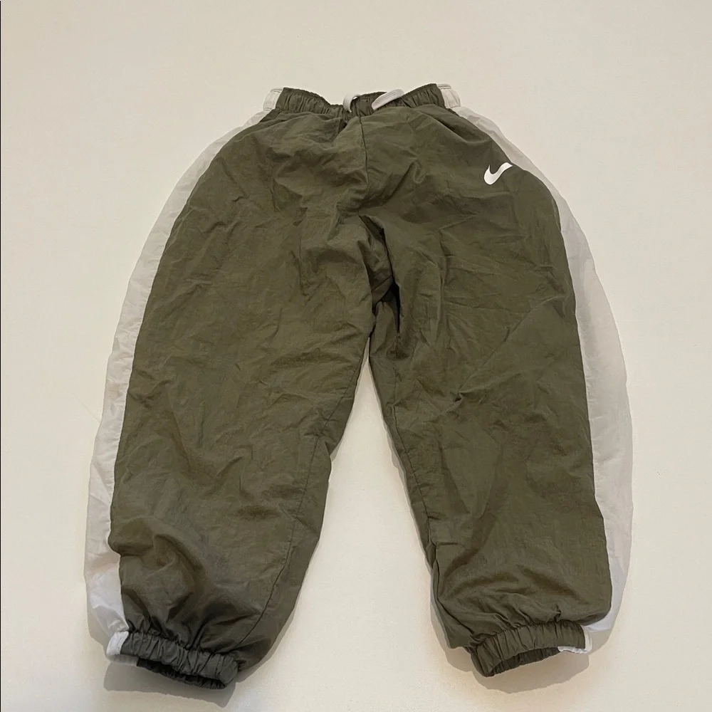 Nike Green Joggers with White Stripes